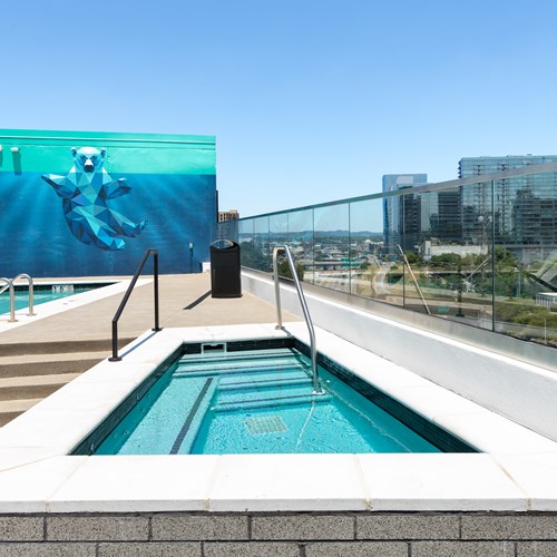rooftop hot tub with mural