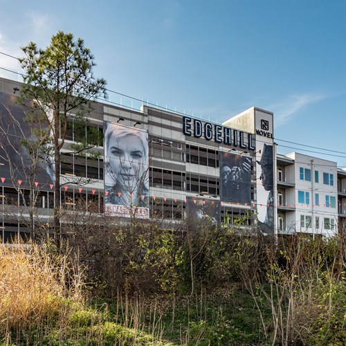 building exterior with face murals