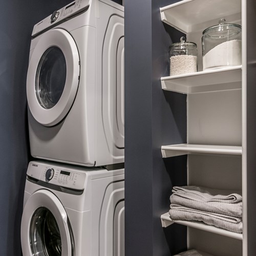 model closet with washer and dryer